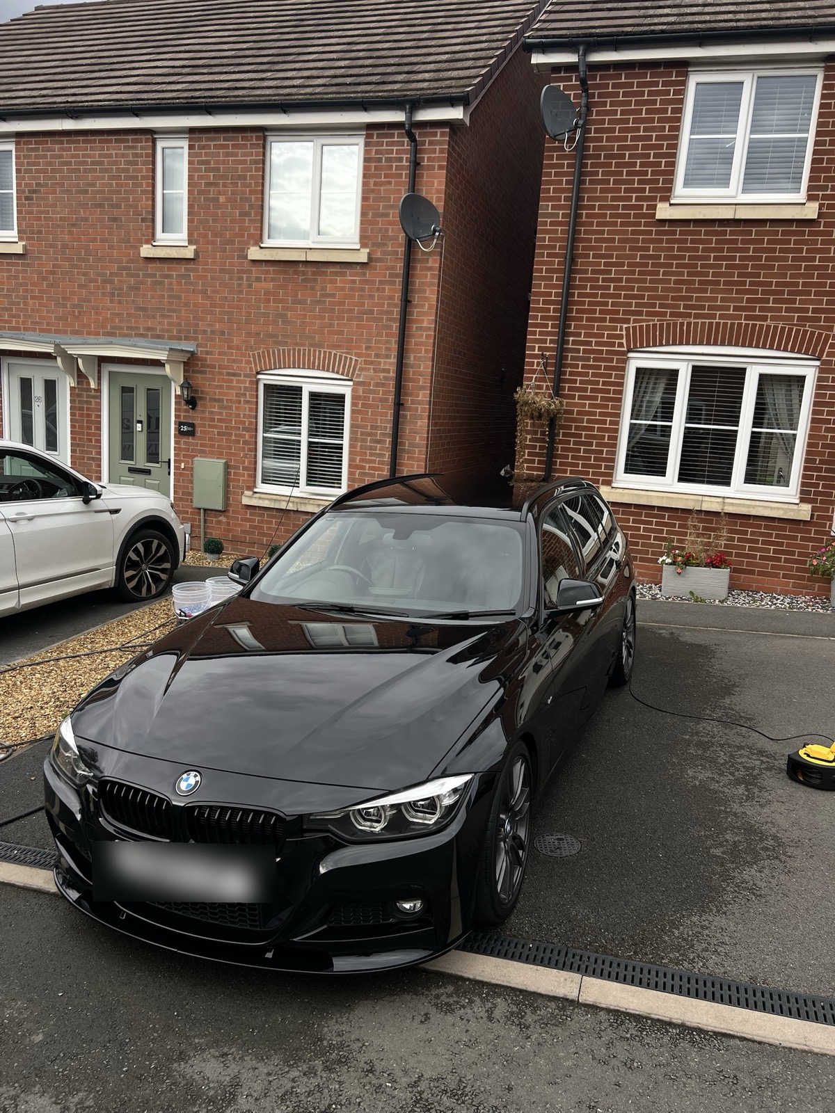 BMW 320D exterior detail, deep gloss black paintwork